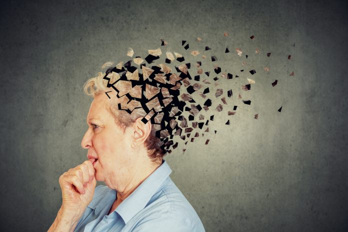 Older woman losing parts of head and looking confused as a symbol of dementia, which the type 2 diabetes treatment SGLT-2 inhibitors could help prevent