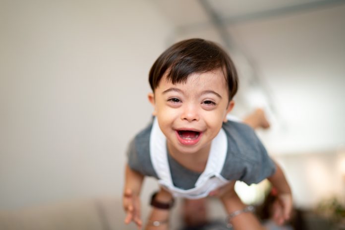 Mother throwing up her Son with Down Syndrome at home