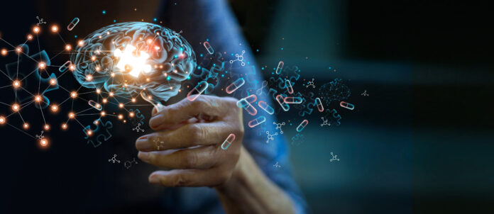 Elderly woman holding brain symbol with pills floating across the image from the brain to symbolize treatment for Alzheimer's disease and other dementia.