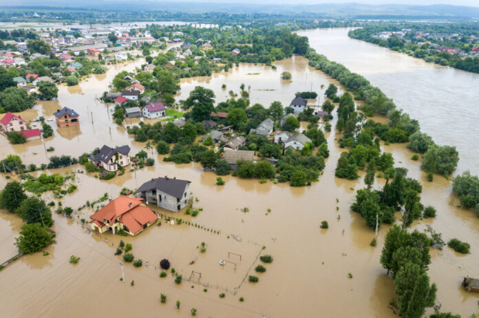 Aerial view of flooded houses with dirty water of Dnister river in Halych town, western Ukraine.